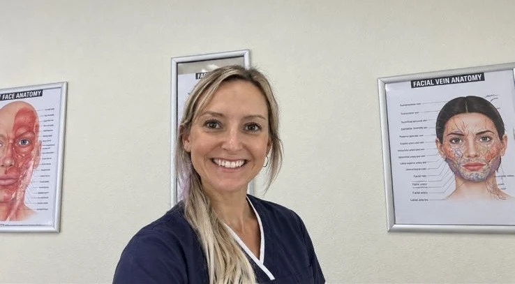 Emily smiling in the clinic