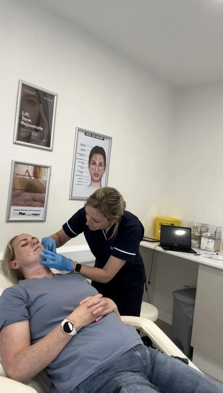 Emily caring for a client in the clinic